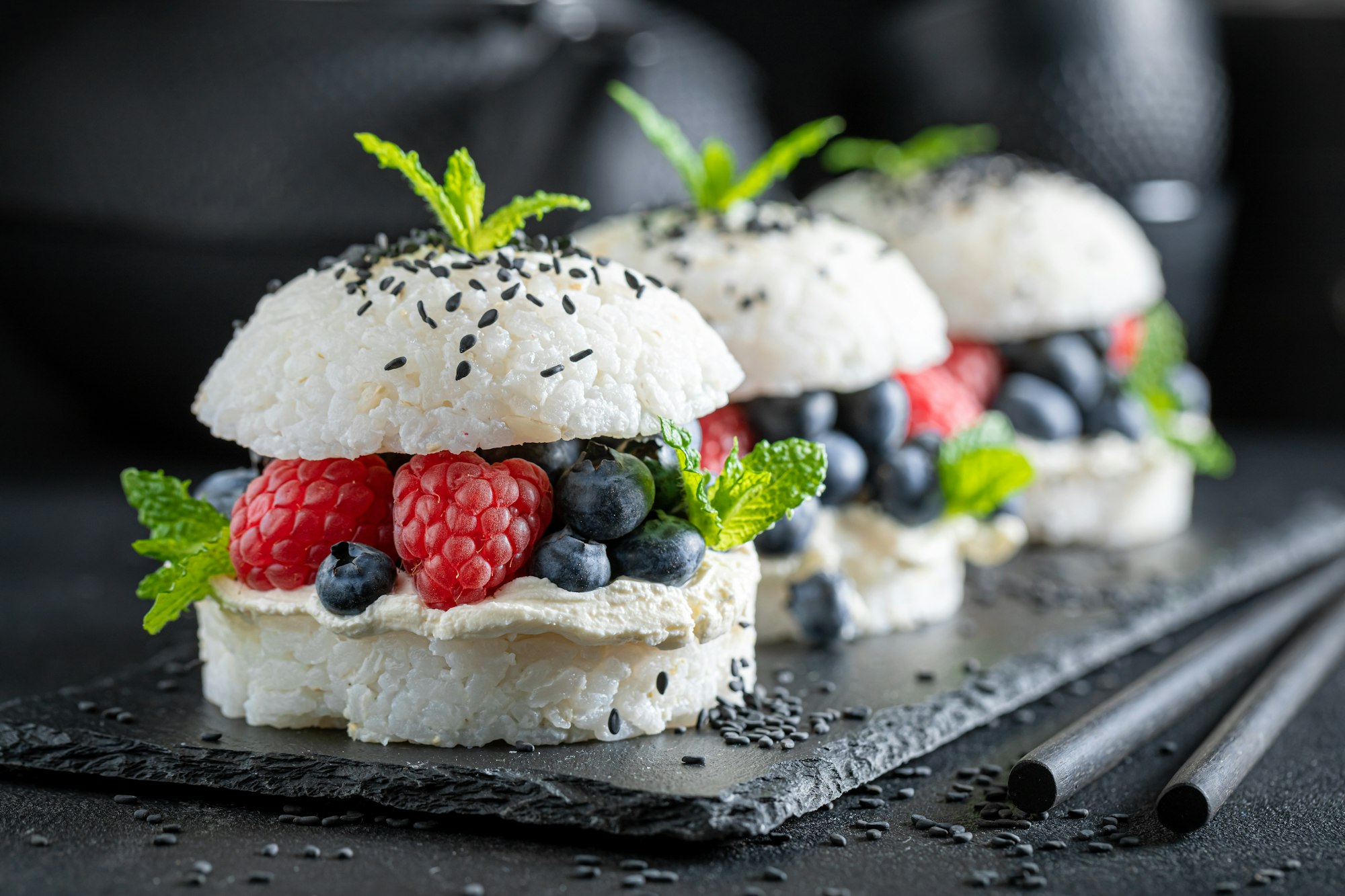 Delicious sush burger with berries and sesame as Japanese dessert.